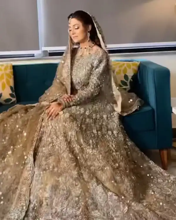 Bridal make-up, champagne gown, seated